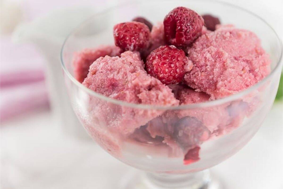watermelon ice cream topped with raspberries