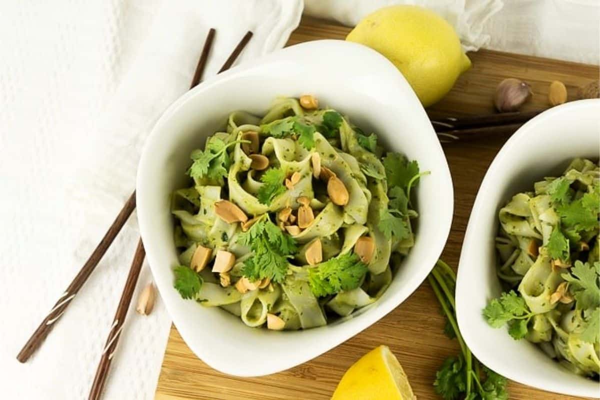 Creamy avocado pesto with wide rice noodles