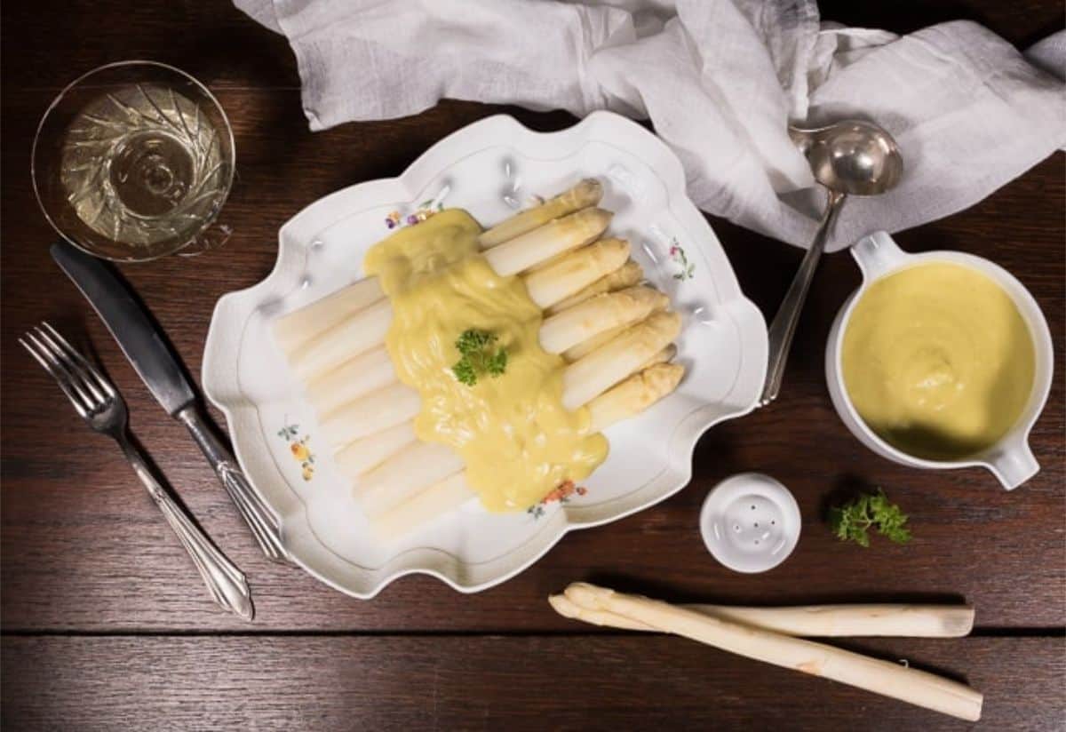 healthy Hollandaise sauce over white asparagus