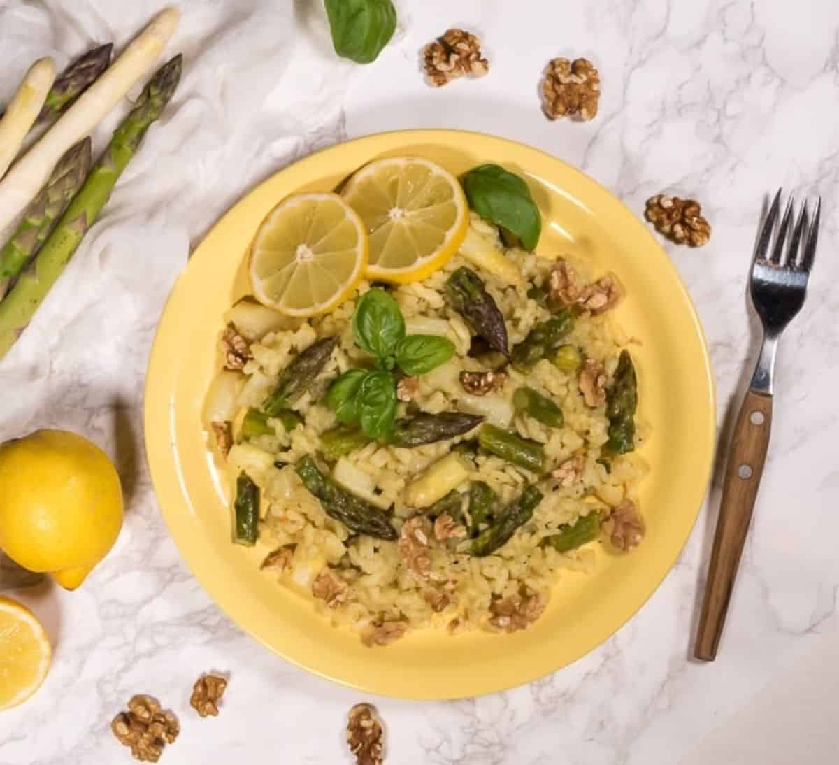Green and white asparagus risotto on a plate