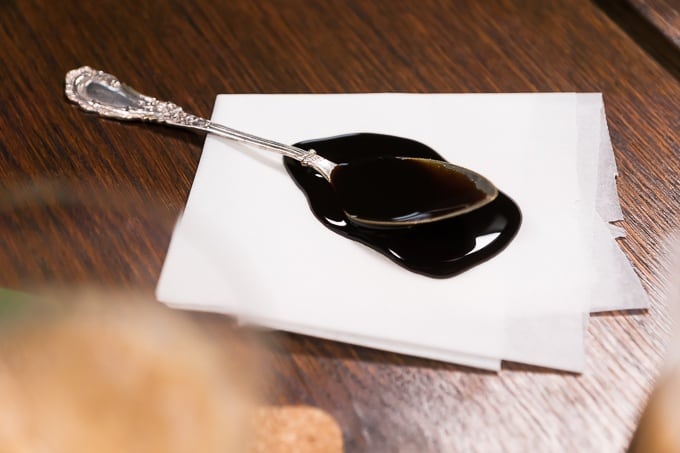 Teaspoon with molasses for sweetening the coffee smoothie recipe