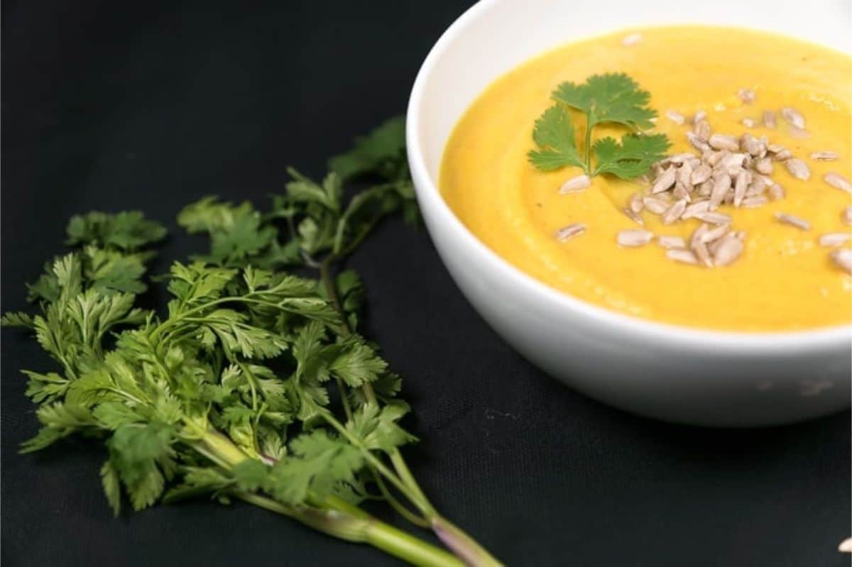 Creamy Carrot and Sweet Potato Soup easy carrot and sweet potato soup, topped with cilantro