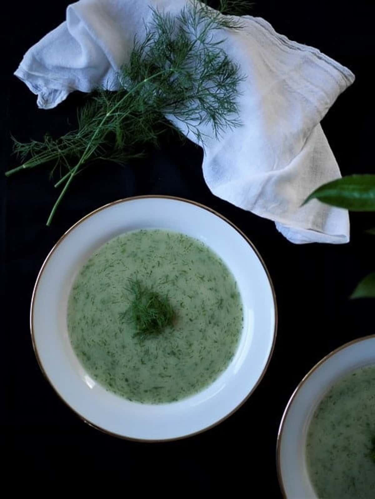 Dill soup on a plate