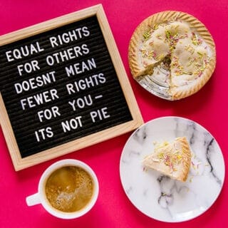 Cake and coffee with a board saying "Equal rights for others doesn't mean fewer rights for you - it's not pie."