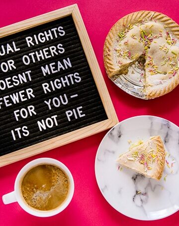 Cake and coffee with a board saying "Equal rights for others doesn't mean fewer rights for you - it's not pie."