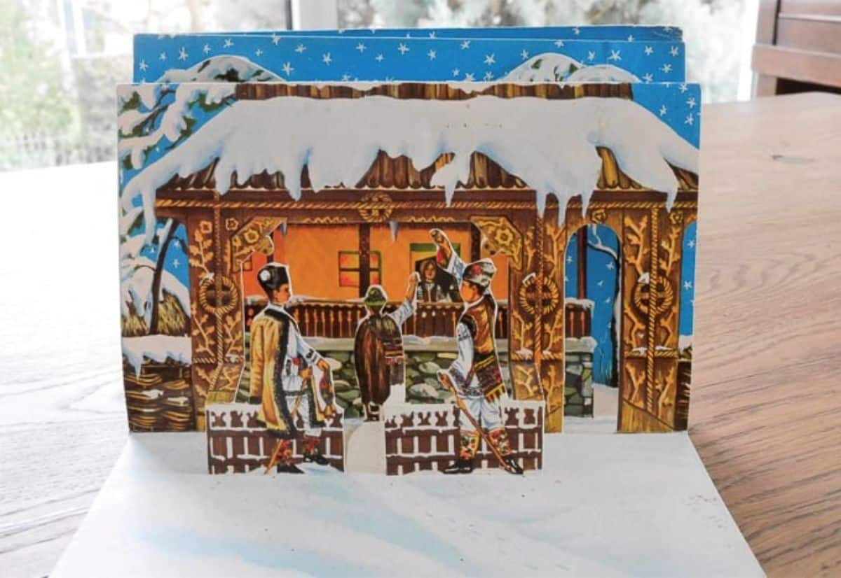 Sorcova: a Romanian New Year's custom where people are caroling and wishing others luck as depicted on this old-fashioned poscard