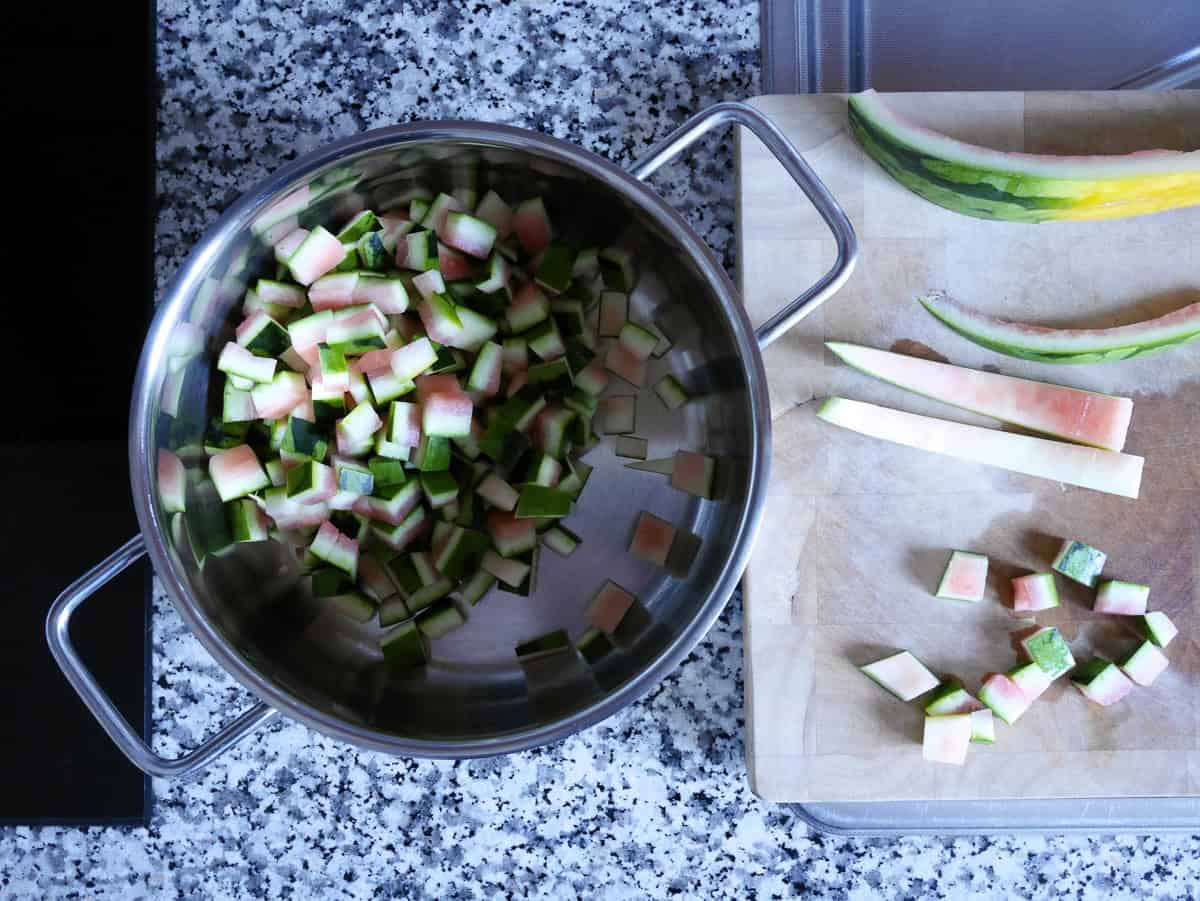 Chopped watermelon rind pieces ready to get cooked