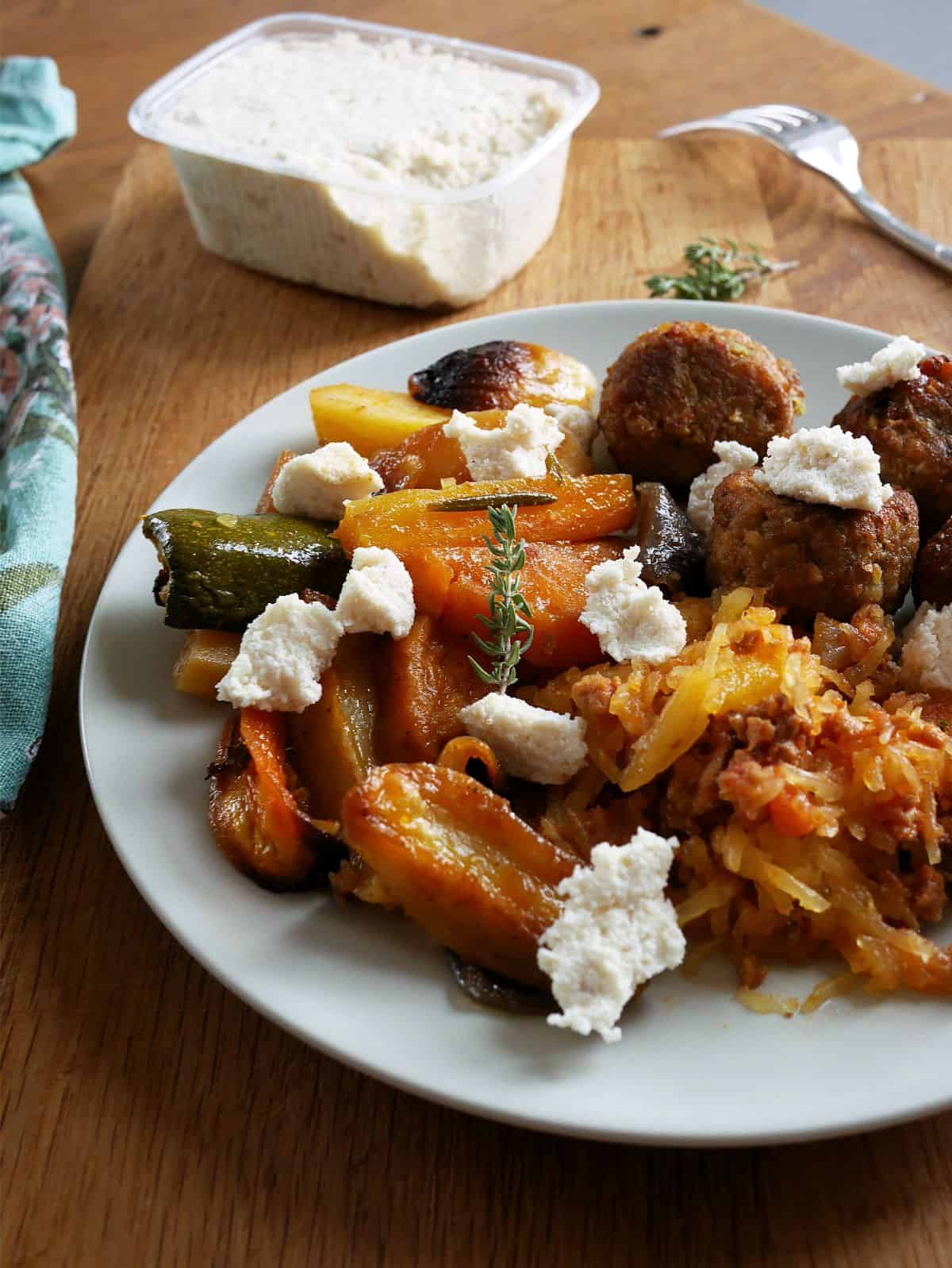 Heaps of soft vegan feta on grilled veggies