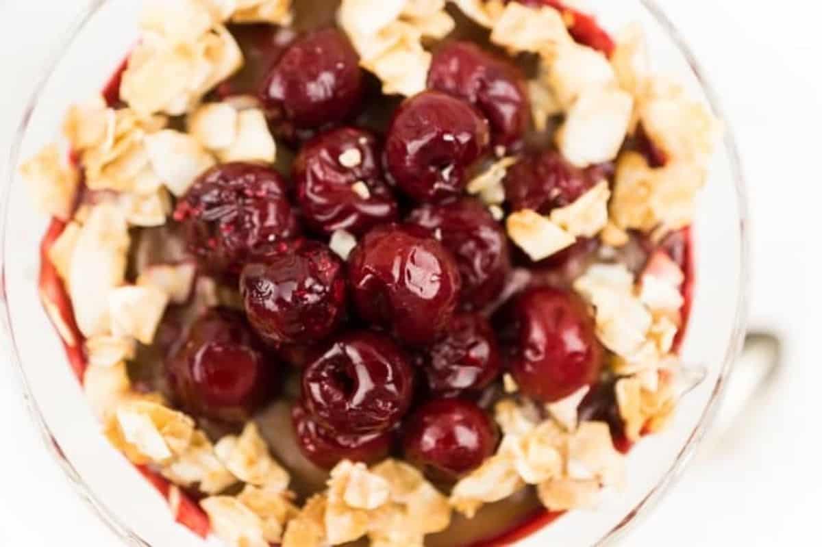 Creamy Coconut Chocolate Pudding with Sour Cherries and Coconut Brittle sour cherries and coconut brittle chips