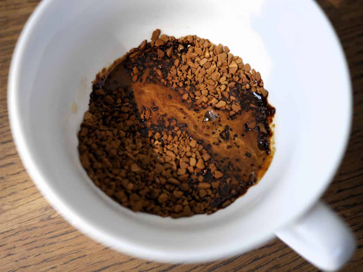 step 1 of making dalgona cream (combine water, instant coffee, and sugar)